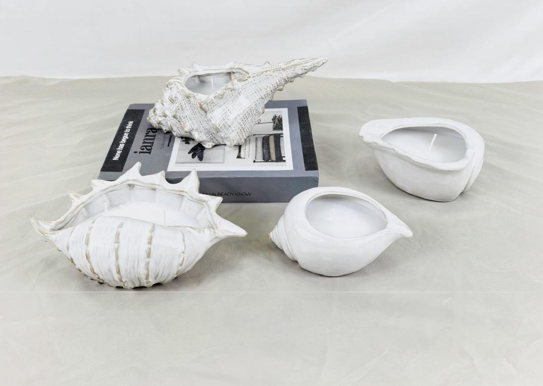 Οι κατόχοι κεριών έρχονται σε πολλές μορφές. Έχετε δει ποτέ ένα σχήμα σαν κοχύλι;